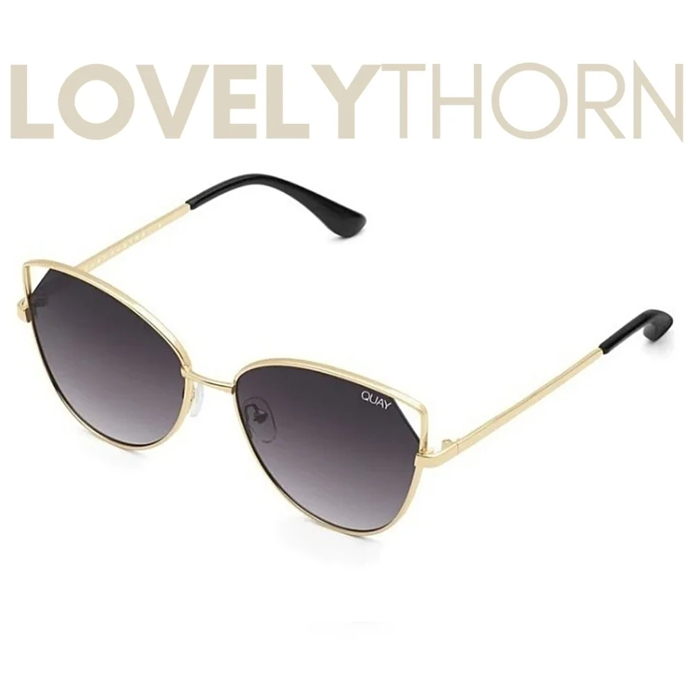QUAY // ltd ed cut-out cateye sunglasses gold frames smoke lenses